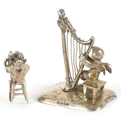 304 - Two Victorian and later miniature silver figures of Putti playing musical instruments, one Chester 1... 