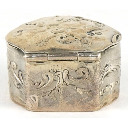 463 - Dutch silver pill box with hinged lid embossed with Putti and foliage, Sheffield import marks 1901, ... 