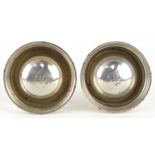 466 - Mappin & Webb, pair of Elizabeth II circular silver open salts with clear glass liners, London 1937,... 