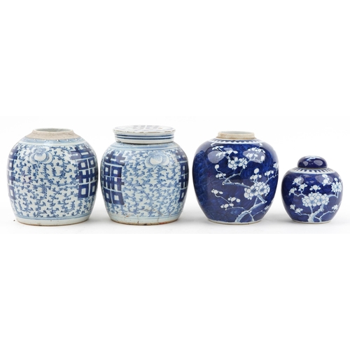 412 - Four Chinese blue and white porcelain ginger jars including two hand painted in the prunus pattern, ... 