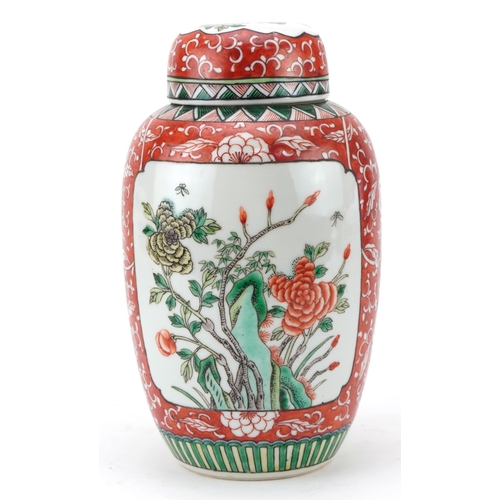 531 - Chinese porcelain iron red ground ginger jar with cover hand painted in the famille verte palette wi... 