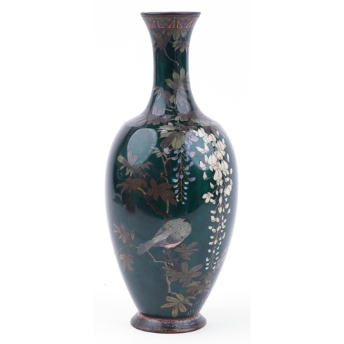 115 - Large Japanese green ground cloisonne vase enamelled with a bird amongst wisteria, 44cm high