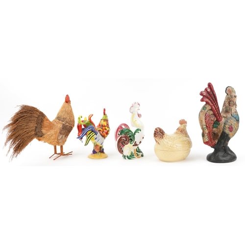 2371 - Five decorative chickens including a pottery egg basket and cover, straw work example and one hand p... 