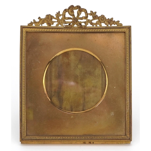 302 - Good quality 19th century brass strut photo frame with bow crest impressed A F to the strut, 16cm x ... 