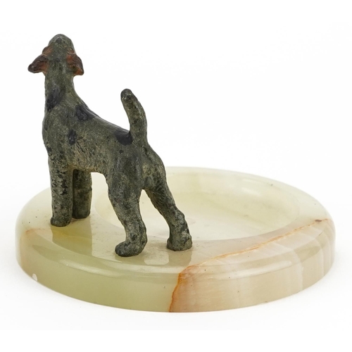 435 - Early 20th century onyx dish surmounted with an Austrian cold painted bronze Airedale terrier, 11.5c... 