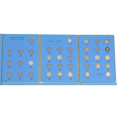 2586 - Three Great Britain coin collection folders with various coins comprising three pence silver, sixpen... 