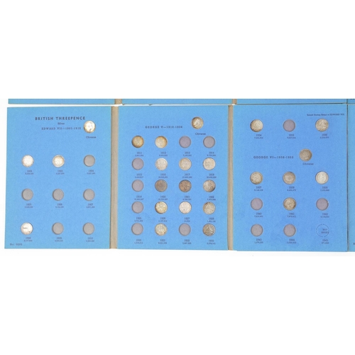 2586 - Three Great Britain coin collection folders with various coins comprising three pence silver, sixpen... 