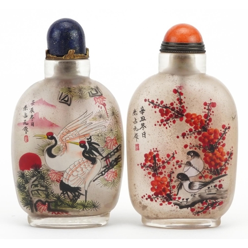 2316 - Two Chinese glass snuff bottles with stoppers hand painted with animals amongst flowers, each with c... 