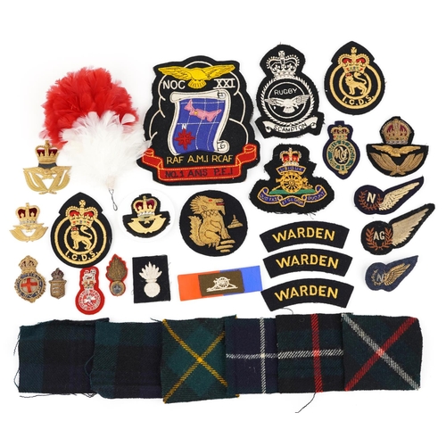 2429 - Military interest cloth badges, cap badges and shoulder titles including Warden and Argyll Black Wat... 