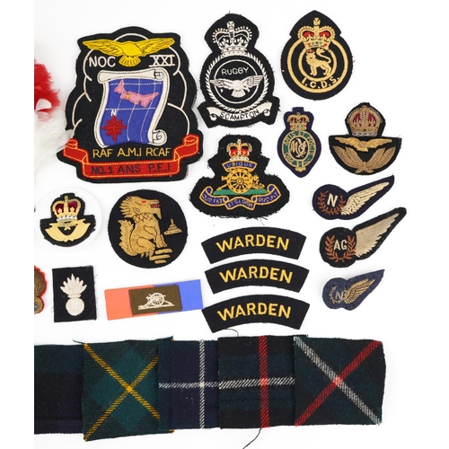 2429 - Military interest cloth badges, cap badges and shoulder titles including Warden and Argyll Black Wat... 