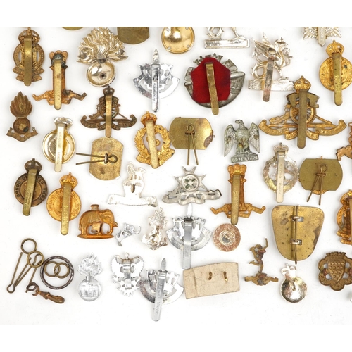 2414 - Large collection of British military interest cap badges including Wessex, Royal Engineers and Army ... 