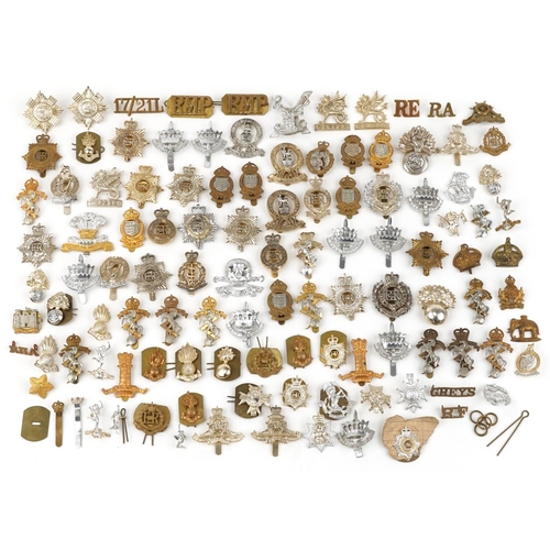 2415 - Large collection of British military interest cap badges including 10th Royal Hussars and Royal Engi... 