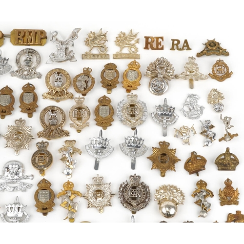 2415 - Large collection of British military interest cap badges including 10th Royal Hussars and Royal Engi... 