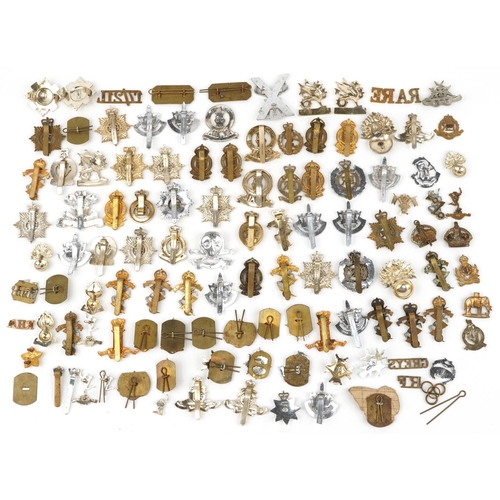 2415 - Large collection of British military interest cap badges including 10th Royal Hussars and Royal Engi... 