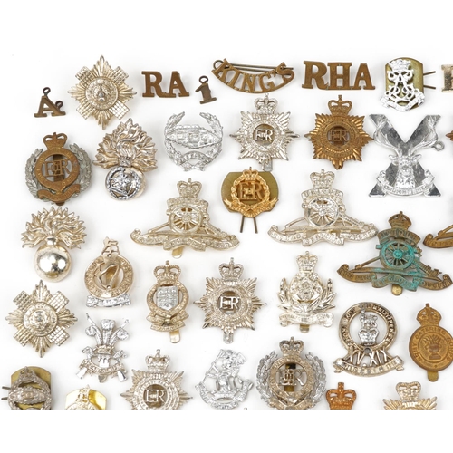 2416 - Large collection of British military interest cap badges including Yorkshire Regiment, Army Catering... 