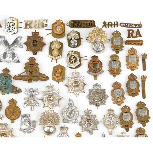 2416 - Large collection of British military interest cap badges including Yorkshire Regiment, Army Catering... 