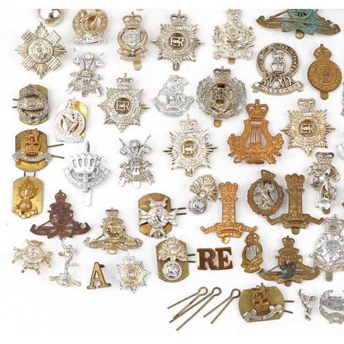 2416 - Large collection of British military interest cap badges including Yorkshire Regiment, Army Catering... 