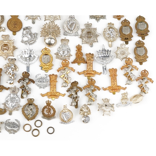 2416 - Large collection of British military interest cap badges including Yorkshire Regiment, Army Catering... 