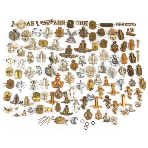 2416 - Large collection of British military interest cap badges including Yorkshire Regiment, Army Catering... 