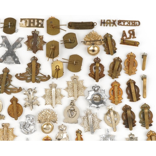 2416 - Large collection of British military interest cap badges including Yorkshire Regiment, Army Catering... 