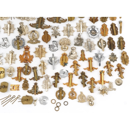 2416 - Large collection of British military interest cap badges including Yorkshire Regiment, Army Catering... 