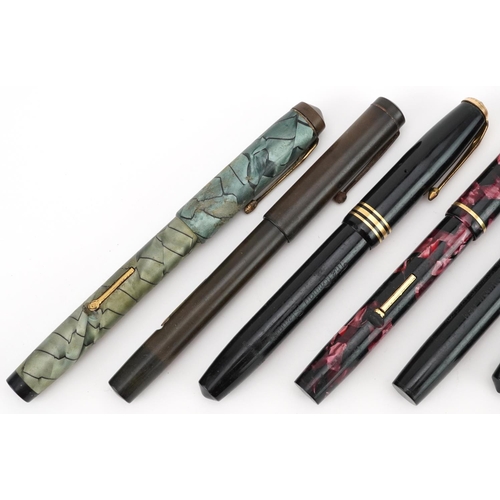 Seven vintage Conway Stewart fountain pens with gold nibs, three