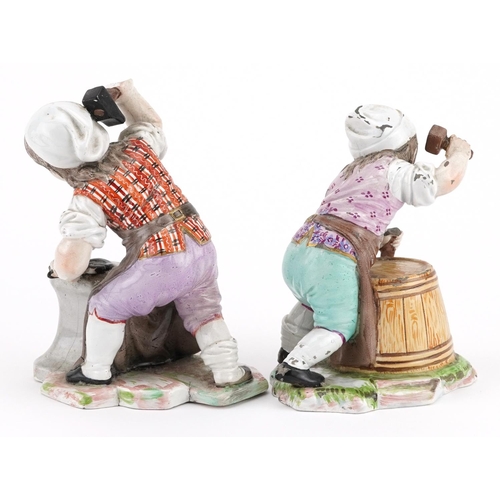 276 - Pair of 19th century continental faience glazed pottery figures including a blacksmith, factory mark... 