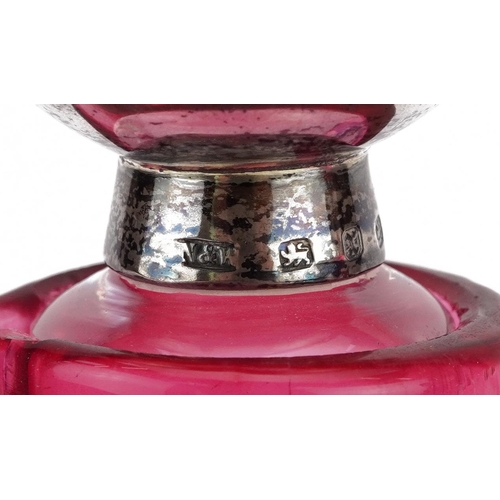52 - Pair of Victorian cranberry overlaid glass claret jugs with silver mounted stoppers, the bodies engr... 