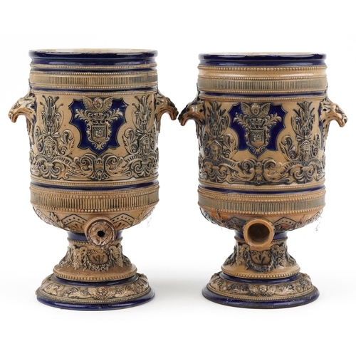 98 - Royal Doulton, pair of Victorian salt glazed stoneware barrels with animalia handles decorated in lo... 