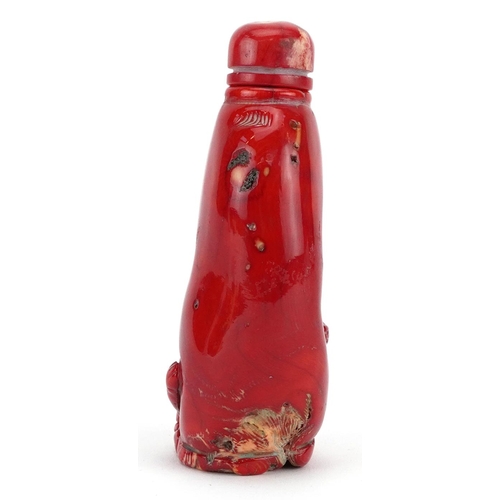 2373 - Chinese carved coral snuff bottle with stopper, 11cm high