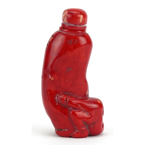 2373 - Chinese carved coral snuff bottle with stopper, 11cm high