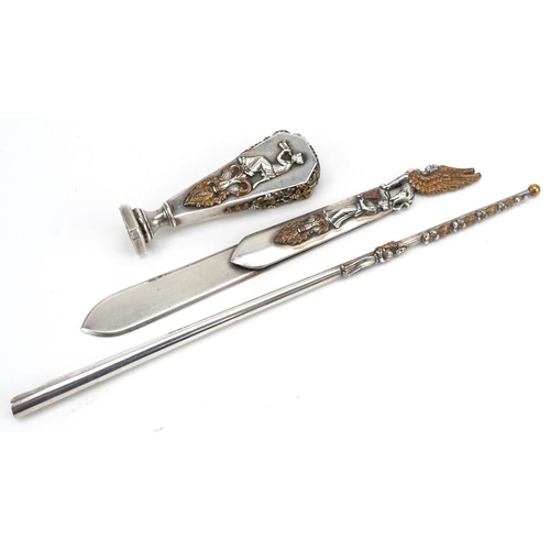 425 - 19th century Egyptian Revival partially gilt silver plated three piece desk set comprising dip pen, ... 