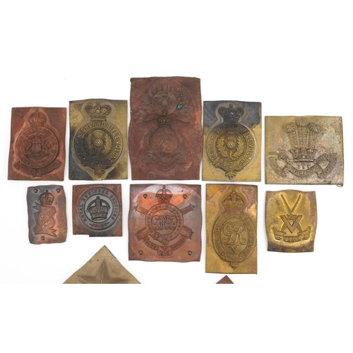 2430 - Twelve military interest metal cap badge type plaques including The Cameroonians, Perth Highland Rif... 