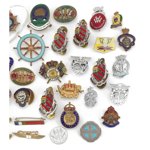 2422 - Collection of predominantly military interest pin badges and lapels including Civil Defence Corps, M... 