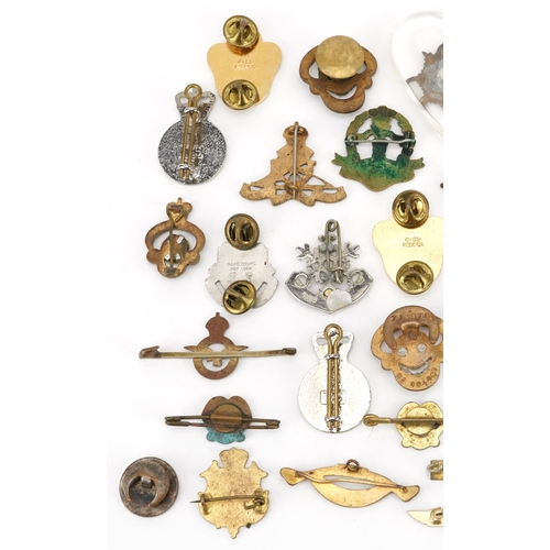 2422 - Collection of predominantly military interest pin badges and lapels including Civil Defence Corps, M... 