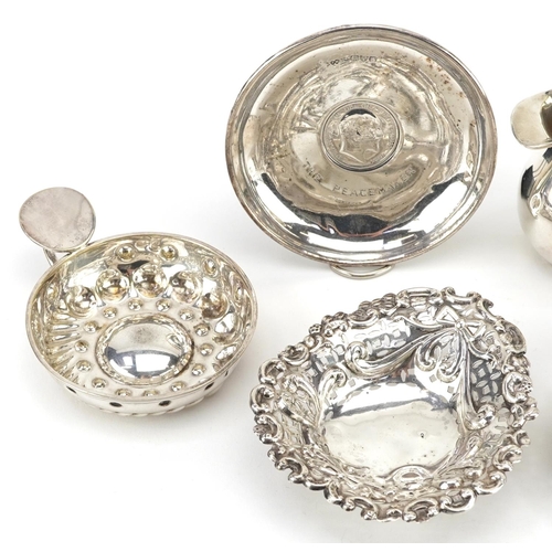 227 - Edwardian and later silver objects comprising a pair of pierced and embossed bonbon dishes, Edward V... 