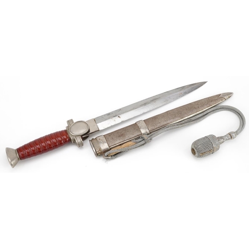 2490 - German military Third Reich Red Cross dagger with scabbard and portepee, 39cm in length
PROVENANCE: ... 