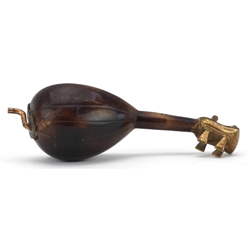 370 - 19th century novelty metal tape measure in the form of a mandolin, 7cm in length