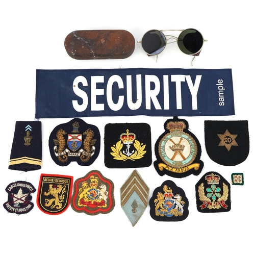 2428 - British militaria including a pair of World War II RAF Aviator anti glare sunglasses with tin case i... 