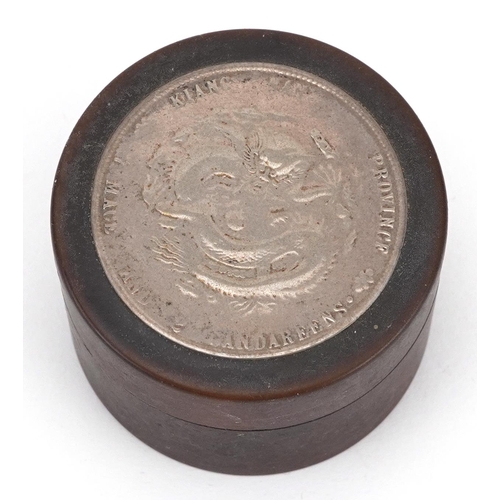 179 - Chinese unmarked silver dragon dish inset with a Fat Man dollar and a hardwood cylindrical box inset... 