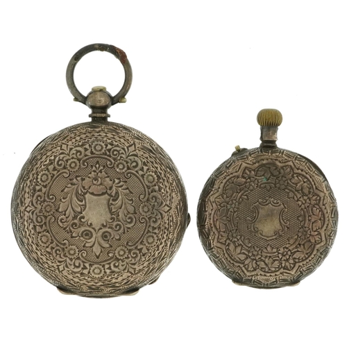 3941 - Two ladies engraved silver open face pocket watches, one with ornate silvered dial, the largest 40mm... 