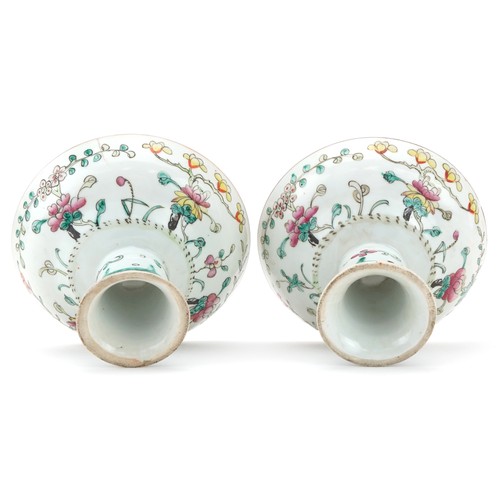 316 - Pair of Chinese porcelain stem bowls hand painted in the famille rose palette with flowers, each 14c... 