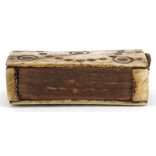 373 - Set of 19th century prisoner of war bone dice housed in a carved bone cradle with slide lid, 5cm in ... 