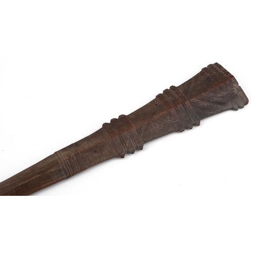 88 - 19th century Tongan war club carved with geometric motifs, 87cm in length