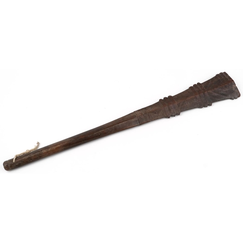 88 - 19th century Tongan war club carved with geometric motifs, 87cm in length