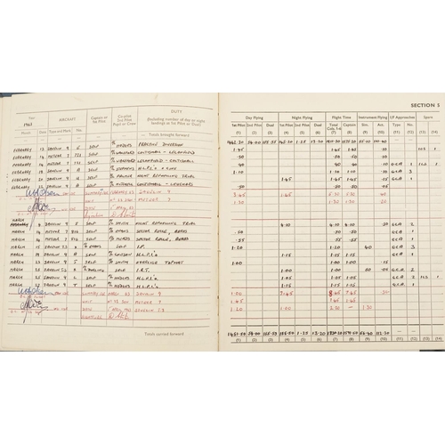 2453 - Military interest Royal Air Force flying log book relating Flight Lieutenant Donald Frank Christmas ... 