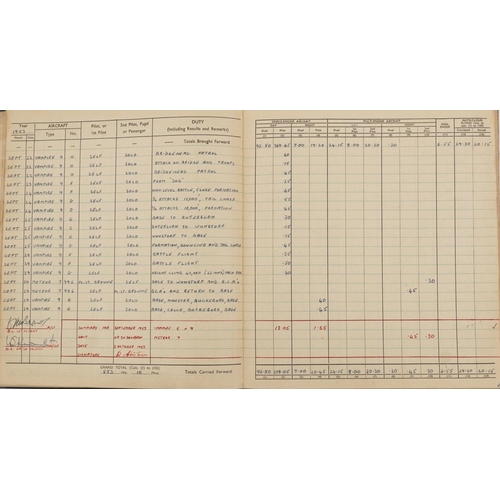 2452 - Military interest Royal Air Force flying log book relating Flight Lieutenant Donald Frank Christmas ... 