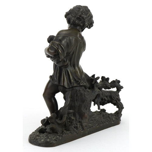 71 - 19th century patinated bronze group of a young child with two dogs, impressed 14863 to the reverse, ... 