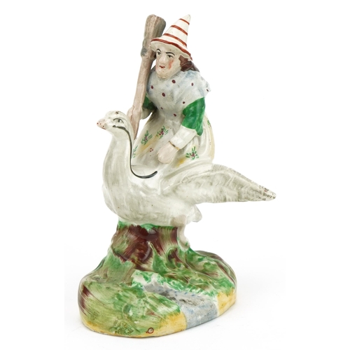 168 - Victorian Staffordshire pottery figure of Mother Goose, 18.5cm high