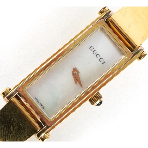 3916 - Gucci, ladies Gucci 1500L wristwatch with mother of pearl dial with box and paperwork, the case 12.2... 